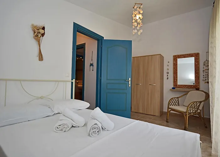 Iris Maisonettes And *